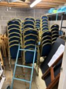 Approximately 80 metal framed banquet chairs with blue upholstery. Also includes remaining contents