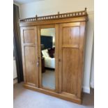 Triple door wardrobe with mirror to middle door and internal drawers. 1830mm x 575mm x 2160mm