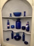 Qty of assorted blue glassware and 2 wooden airplane models