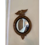 2 round wall mirrors with Eagle emblem to tops. 460mm x 680mm high