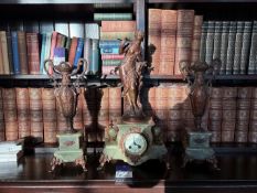 Alabaster ornate mantel clock accompanied by pair of Alabaster and metal candle holders