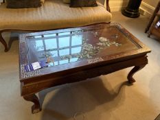 Oriental wooden glass topped coffee table with floral centre and mother of pearl detailing. 1020mm x