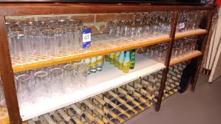 Quantity of various branded and unbranded glassware to bar – Located behind bar
