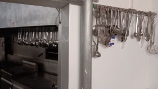 Assortment of cooking utensils – Located in main kitchen