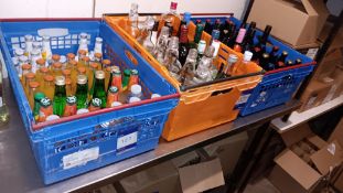 Contents of 3 crates to include wines, beers, part bottles of spirits and tonics and soft drinks –