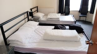 Freestanding and movable furniture to Room 63, including television (excludes all fitted and fixed