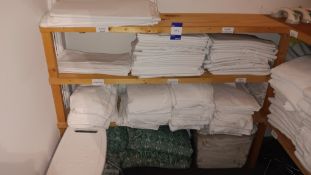 Large quantity of towels, bedding, fans, liquid soaps – Located in guest laundry room