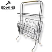 A Mid 20th Century Wirework Magazine Rack, with musical notes and staves, black wire work frame