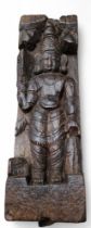 A late 18th/early 19th century architectural fragment/pillar, carved with Gujarat temple figure,