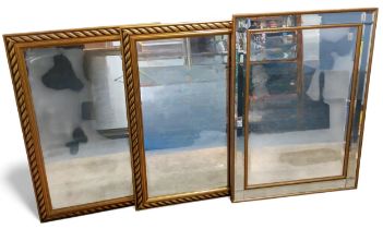 A pair of gilt rectangular mirrors, ropetwist border, 88cm x 62cm;   another (3)