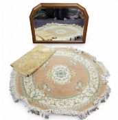 A Kayan woollen circular rug, 129cm diam;   a pine canted rectangular mantel mirror, 73cm high,