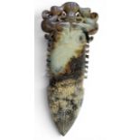 A Chinese Archaic jade ceremonial dagger, carved with mons, scrolls and stylised animals, 29cm long