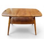 An Ercol elm and beech 'Butlers Tray' coffee table, model no.457, the rounded rectanular top with