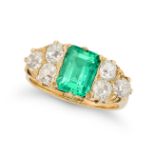 A FINE ANTIQUE COLOMBIAN EMERALD AND DIAMOND RING in 18ct yellow gold, set with an octagonal step