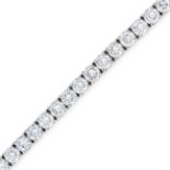 NO RESERVE - A DIAMOND LINE BRACELET set with a row of thirty four round brilliant cut diamonds, the