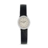L.U. CHOPARD, A LADIES DIAMOND COCKTAIL WATCH, in 18 carat white gold, the oval case surrounding a