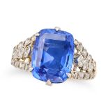 A FINE CEYLON NO HEAT SAPPHIRE AND DIAMOND DRESS RING set with a cushion cut sapphire of 7.32