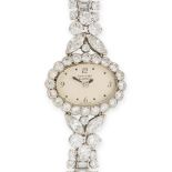 VAN CLEEF & ARPELS, A LADY'S DIAMOND COCKTAIL WATCH the circular cream with Arabic numerals at 12,