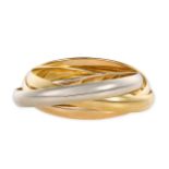 CARTIER, AN EXTRA LARGE TRINITY BANGLE in 18ct tricolour gold, comprising three interlocking yellow,