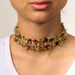 CHANEL, A SUPERB MULTI GEM AND DIAMOND COLLAR NECKLACE in 18ct yellow gold, the openwork collar