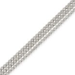NO RESERVE - A DIAMOND BRACELET comprising three rows of round brilliant cut diamonds, the diamonds