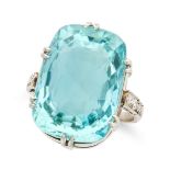 NO RESERVE - A FINE AQUAMARINE AND DIAMOND DRESS RING, MID 20TH CENTURY set with a large cushion cut