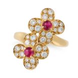 VAN CLEEF & ARPELS, A RUBY AND DIAMOND DOUBLE TREFLE RING in 18ct yellow gold, designed as a pair of