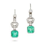 A PAIR OF EMERALD AND DIAMOND DROP EARRINGS each suspending an octagonal step cut emerald drop,
