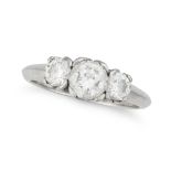 A THREE STONE DIAMOND RING in platinum, set with a round brilliant cut diamond of approximately 0.65