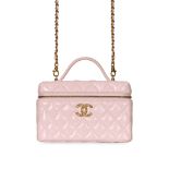 CHANEL PINK PATENT LEATHER SLIM VANITY CASE BAG Condition grade A. Pink quilted patent leather e