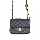 CHANEL COCO CRUSH MINI SQUARE FLAP BAG Condition grade B+. Dark grey quilted leather exterior with