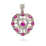 NO RESERVE - A FINE RUBY AND DIAMOND HEART PENDANT in yellow gold and silver, the openwork pendant d