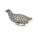 NO RESERVE - AN ANTIQUE DIAMOND AND RUBY PARTRIDGE BROOCH in silver and yellow gold, designed as a p