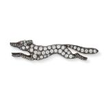 NO RESREVE - AN ANTIQUE DIAMOND AND RUBY FOX BROOCH in silver and yellow gold, designed as a running