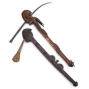 TWO AFRICAN CARVED WOOD AND IRON IMPLEMENTS PROBABLY WEST AFRICAN
