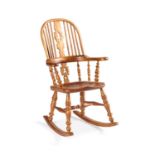 AN ELM CHILD'S WINDSOR ROCKING CHAIR