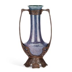 AN ART NOUVEAU BRONZE-MOUNTED VASE BY OTTO ECKMANN