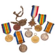 A FIRST WORLD MEDAL TRIO AND TWO FIRST WORLD WAR MEDAL PAIRS