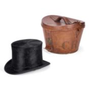 A VICTORIAN SILK TOP HAT AND LEATHER HAT CASE