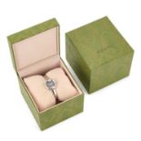 A LADY'S STEEL GUCCI BANGLE WATCH