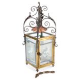 AN ARTS AND CRAFTS COPPER, BRASS AND WROUGHT IRON HALL LANTERN