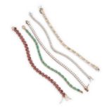 A COLLECTION OF SILVER GEM-SET TENNIS BRACELETS