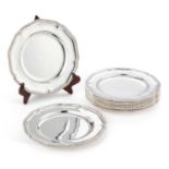 A SET OF TWELVE GEORGE III SILVER DINNER PLATES