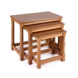 ROBERT THOMPSON OF KILBURN A NEST OF THREE MOUSEMAN OAK TABLES