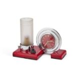 AN ART DECO CHERRY AMBER BAKELITE AND CHROME COMBINATION DESK CLOCK AND LAMP