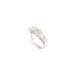 AN OLD-CUT DIAMOND FIVE STONE RING