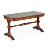 A VICTORIAN BURR OAK WRITING TABLE IN THE MANNER OF GILLOWS