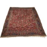 A LARGE PERSIAN HERIZ CARPET
