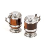 A PAIR OF 17TH CENTURY SILVER-MOUNTED LIGNUM VITAE LIDDED TANKARDS