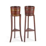 A PAIR OF LISTER OAK PLANTERS ON STANDS EARLY 20TH CENTURY